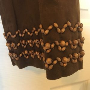 Brown pants with wood accents